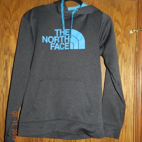 grey and blue north face hoodie